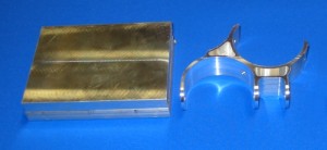 Solid blocks of 6061-T6 aluminum are machined into T2 hardware